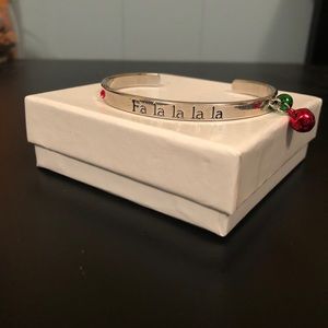 “Fa la la la la” holiday bracelet with jingle bell